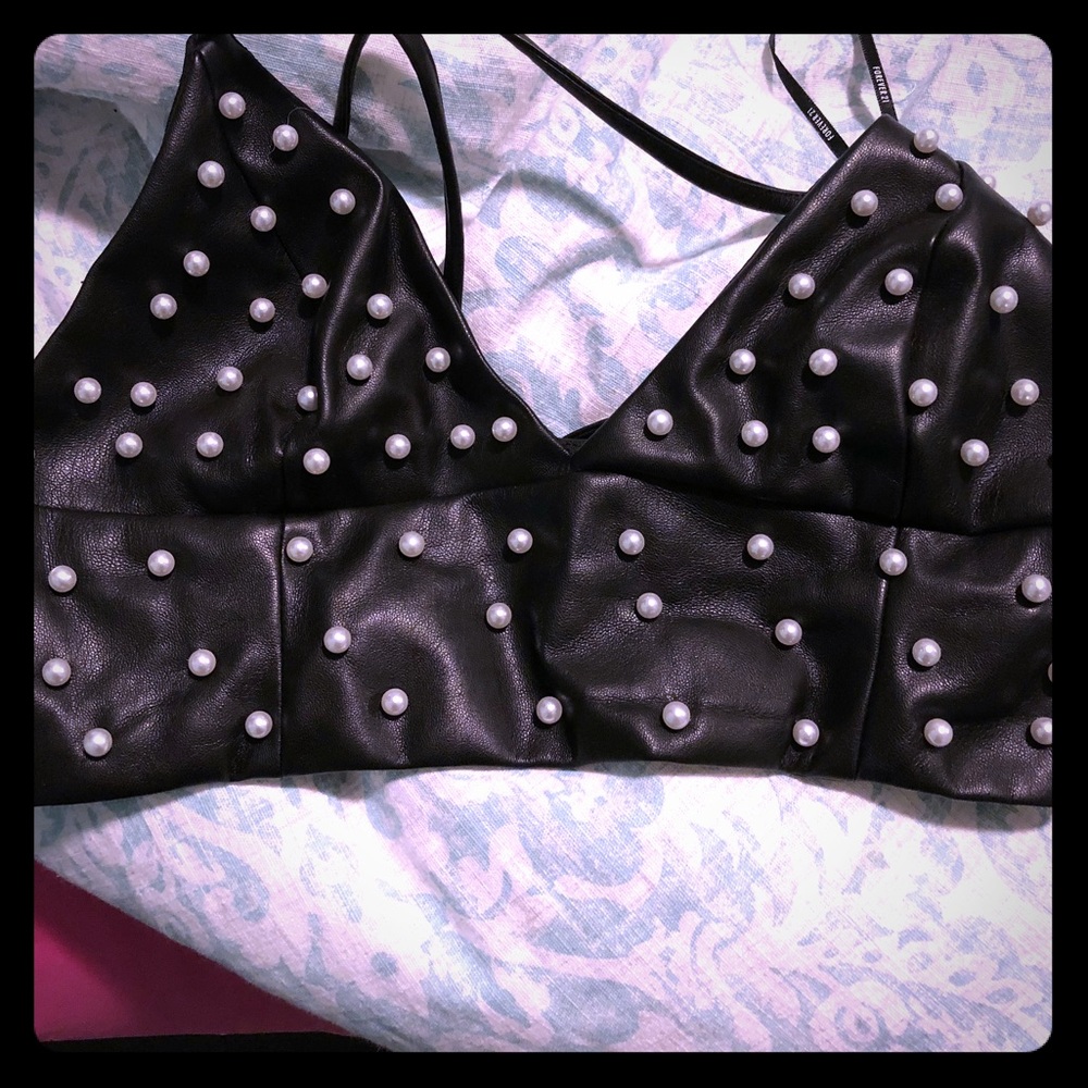 Faux leather crop top with pearl accents